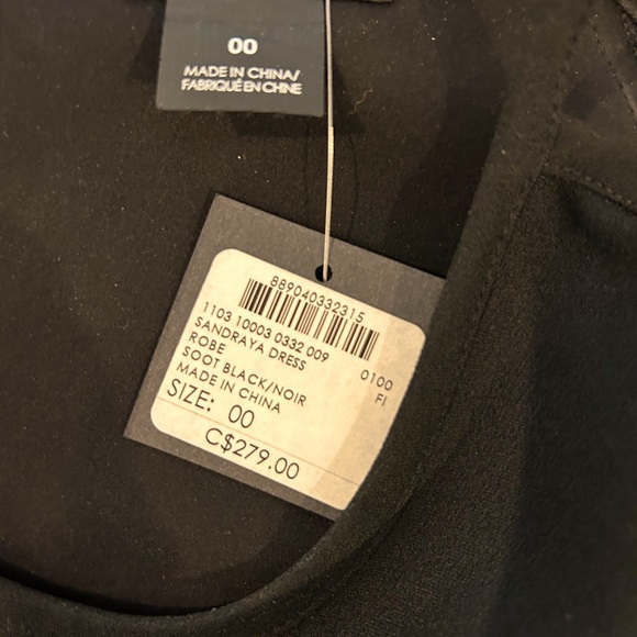 Beautiful black Club Monaco dress with long sleeves but peak-a-boo shoulders. - Picture 3 of 4